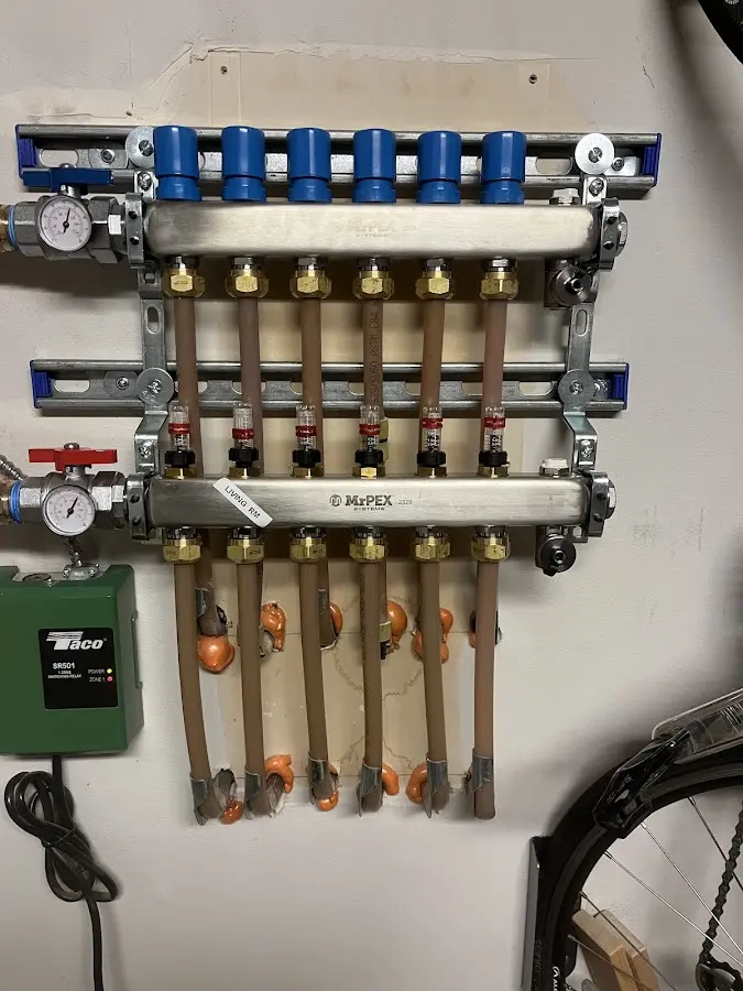 Plumber performing Water Heater Repair at a residential property in Somerset